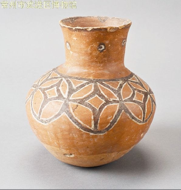 浅谈大汶口文化时期的红陶钱纹壶